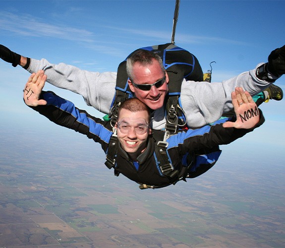 Doctor Snider sky-diving.